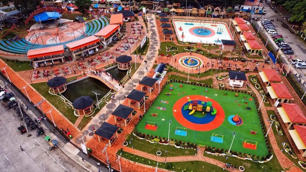 Lagoon, playgrounds and pavilions at the Asenso Wellness Park in Ozamiz