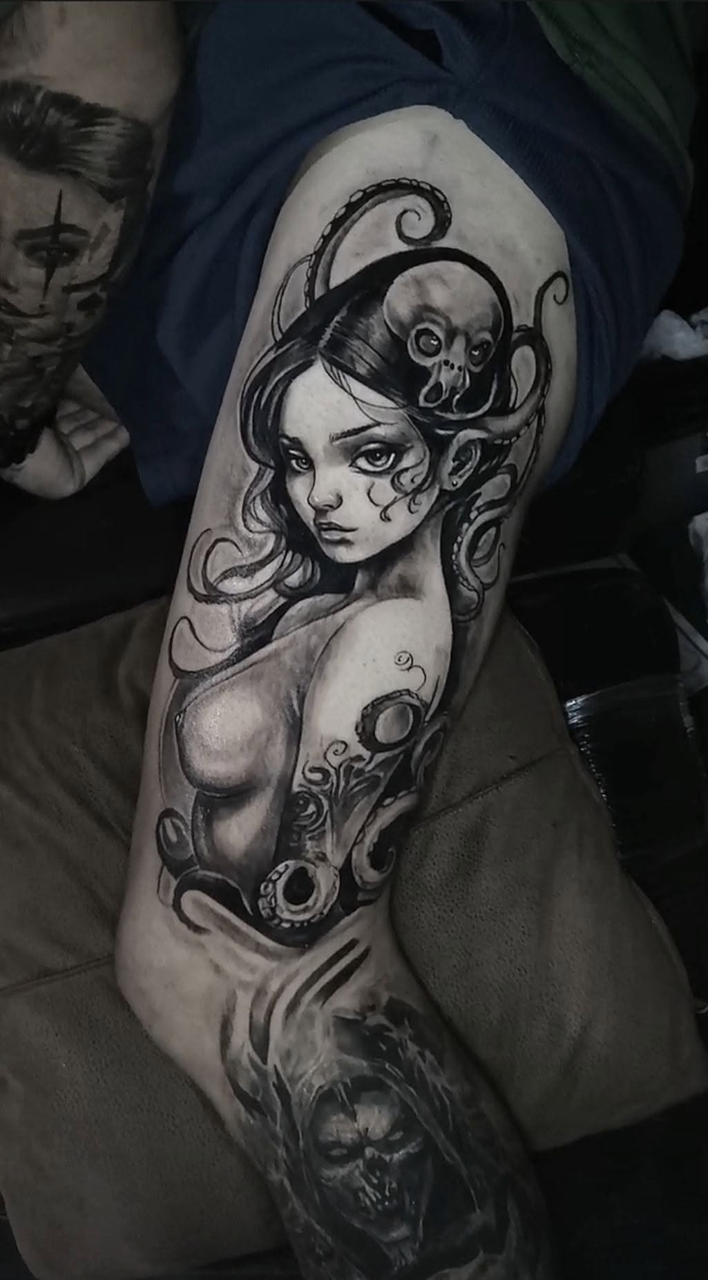 Black and grey dark art tattoo