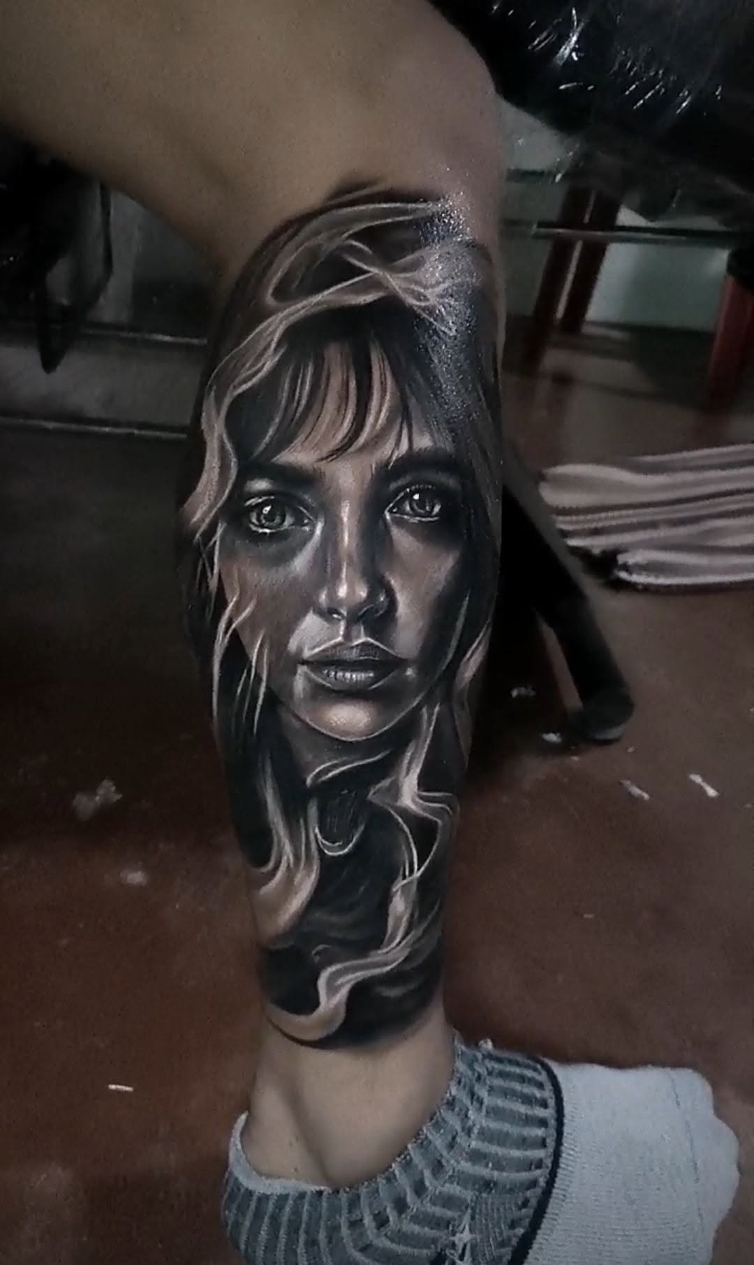 Black and grey realism portrait tattoo