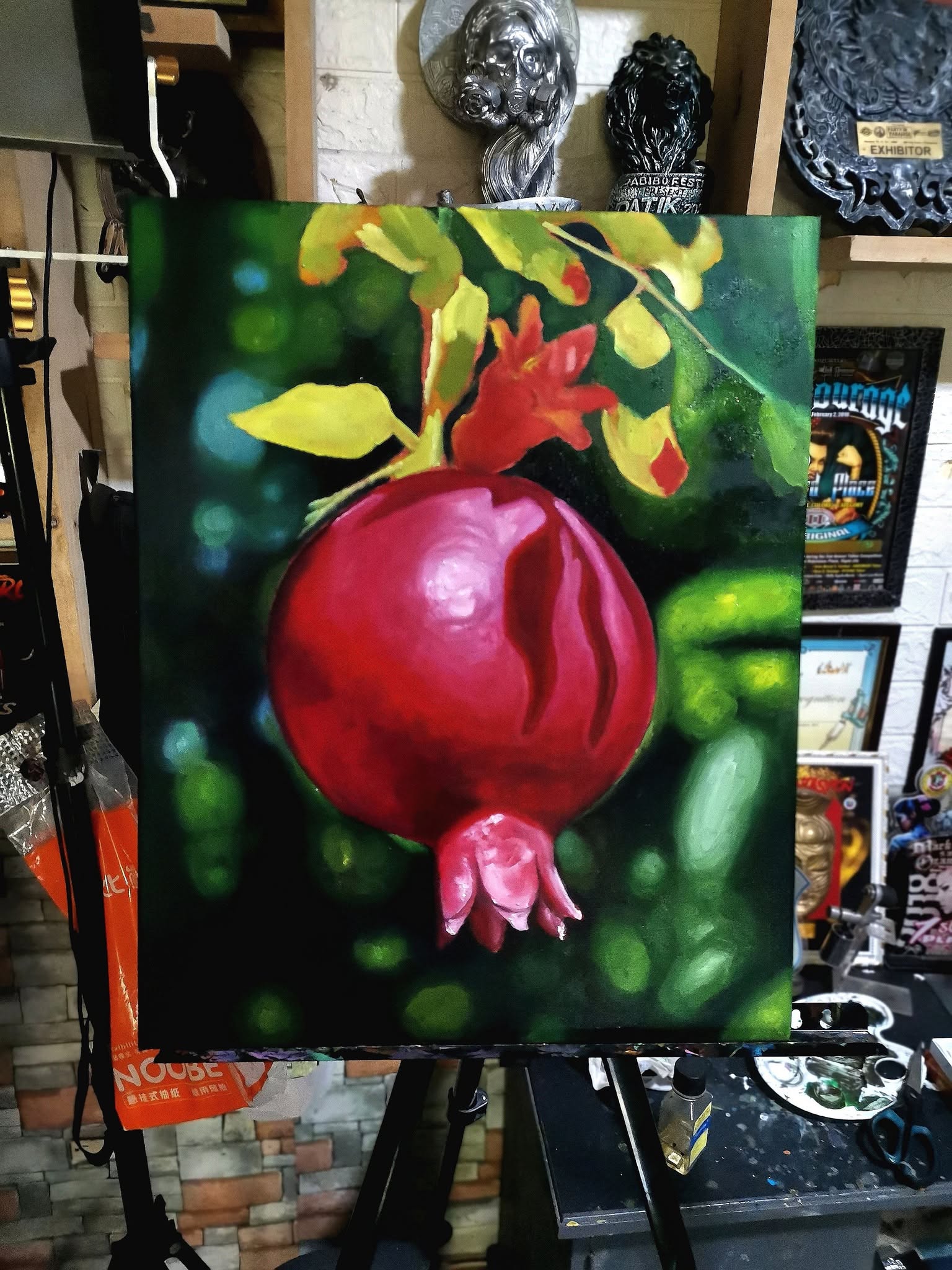 Oil painting of a pomegranate