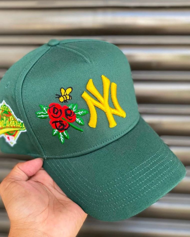 Green cap with embroidered rose patches