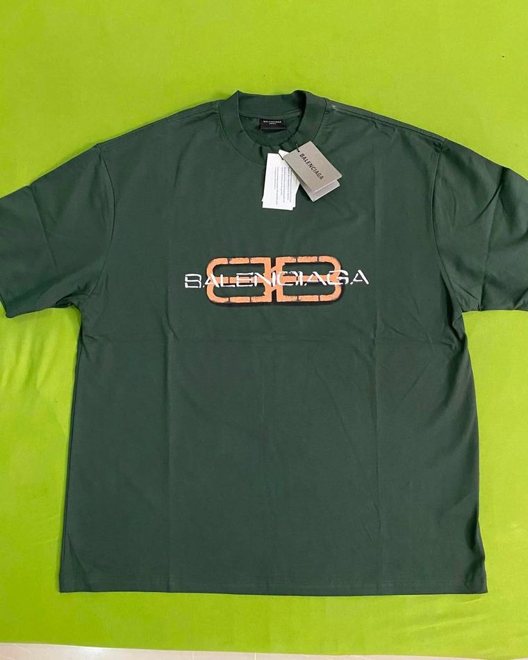 Forest green tee with a small printed chest logo